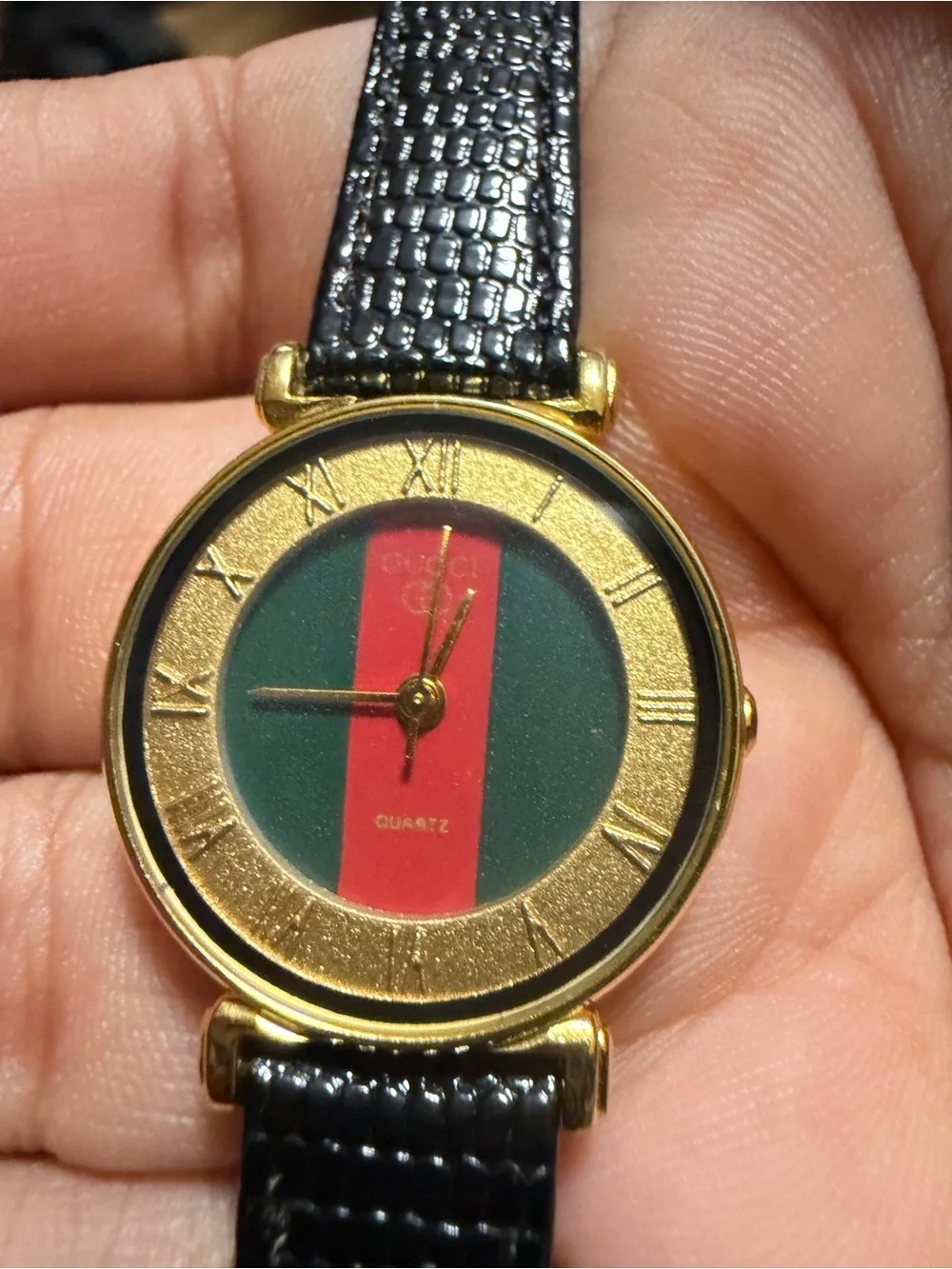 Gold-Tone Watch with Black Strap and Green-Red Dial